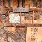 a wall with a bunch of different items on it